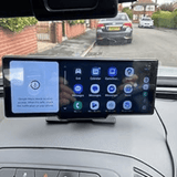 Universal CarPlay Dashboard displaying Google Maps and app icons on a car dashboard for easy navigation and phone access.